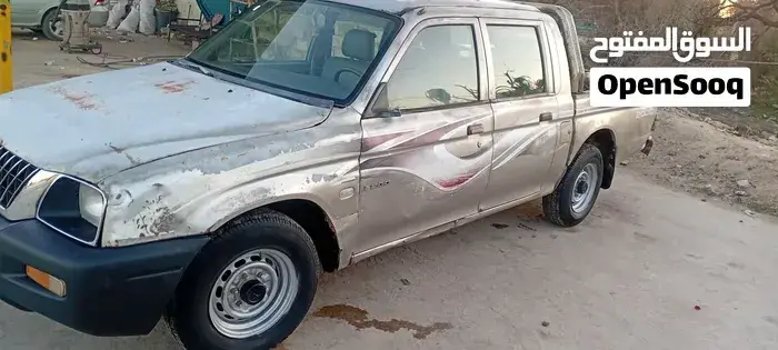 Mitsubishi L200 2004 photo 4