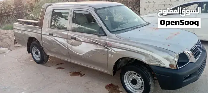 Mitsubishi L200 2004 photo 2