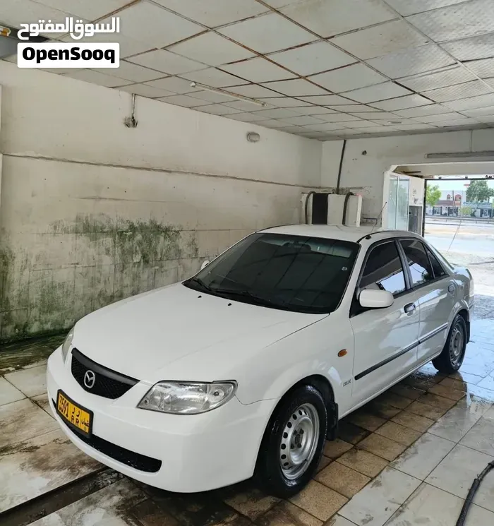 Mazda 323 2003 photo 2
