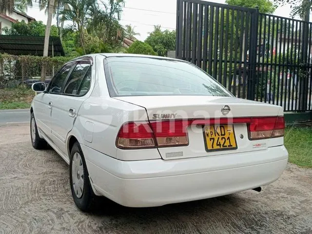 Nissan Sunny 2003 photo 4