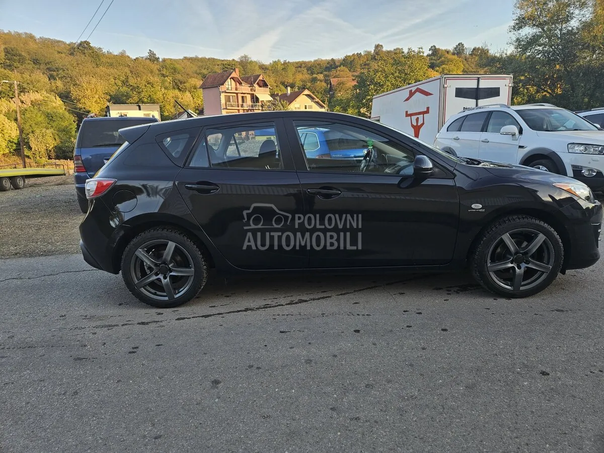Mazda 3 2011 photo 2