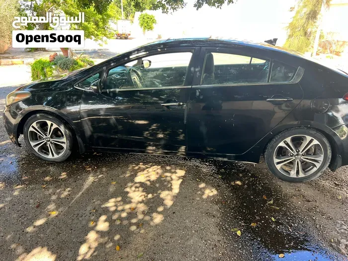 Kia K3 2014 photo 4