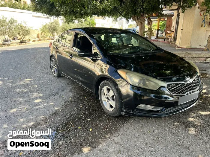 Kia K3 2014 photo 2