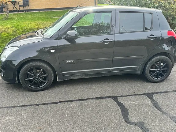Suzuki Swift 2009 photo 2
