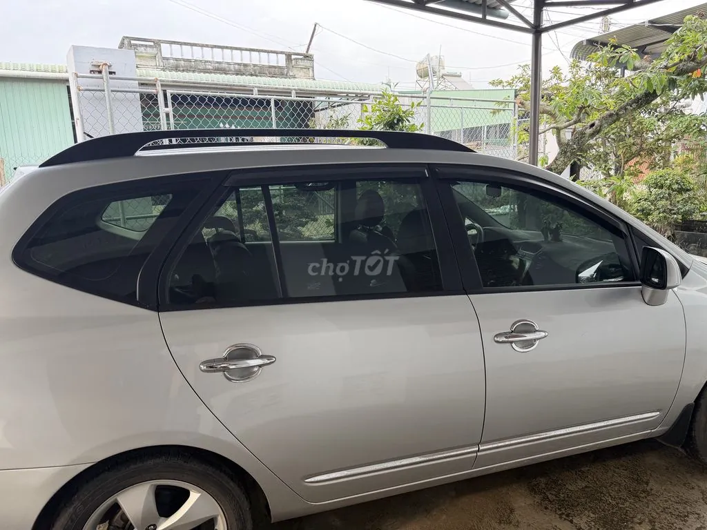 Kia Carens 2009 photo 2