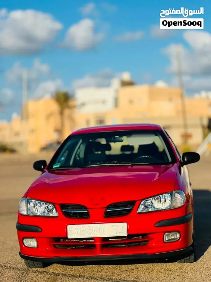 Nissan Almera 2000 photo 2