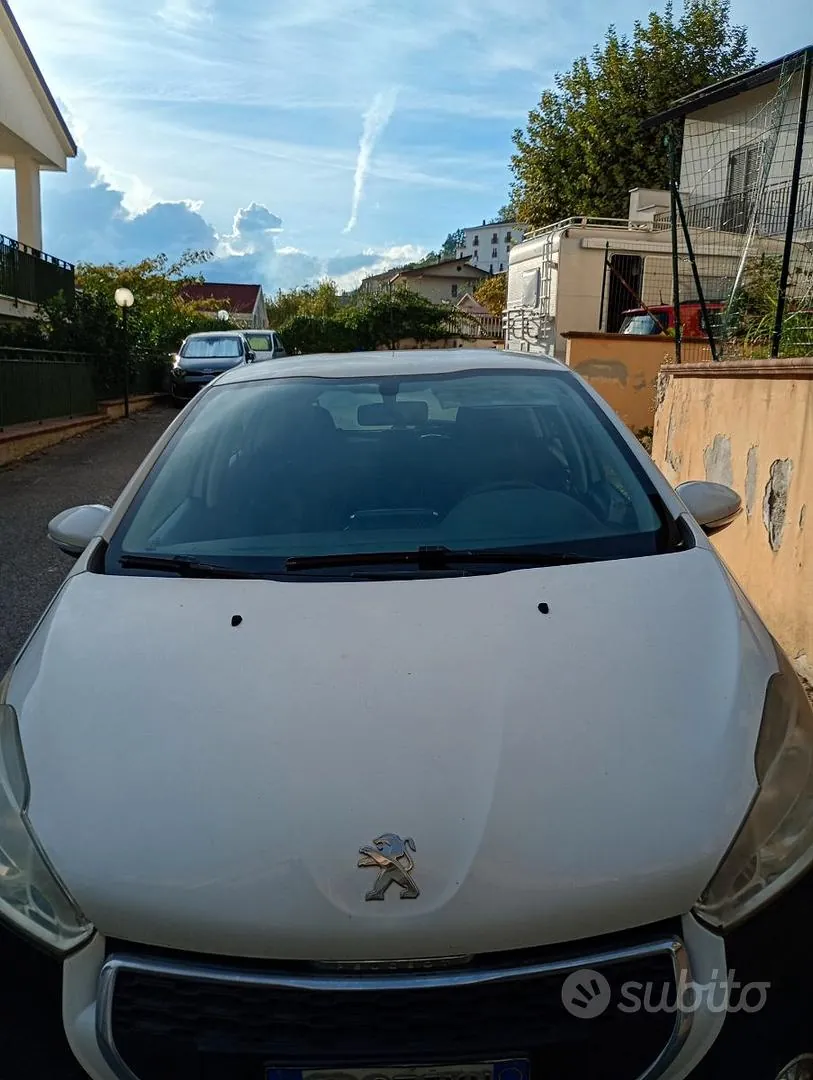 Peugeot 208 2013 photo 4
