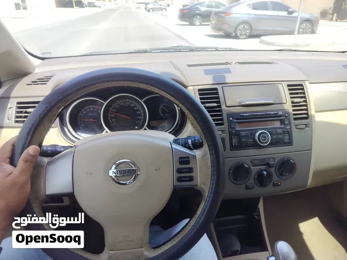 Nissan Tiida 2012 photo 5