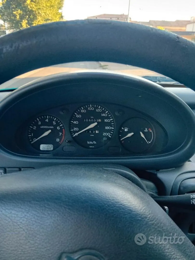 Nissan Micra 1997 photo 4