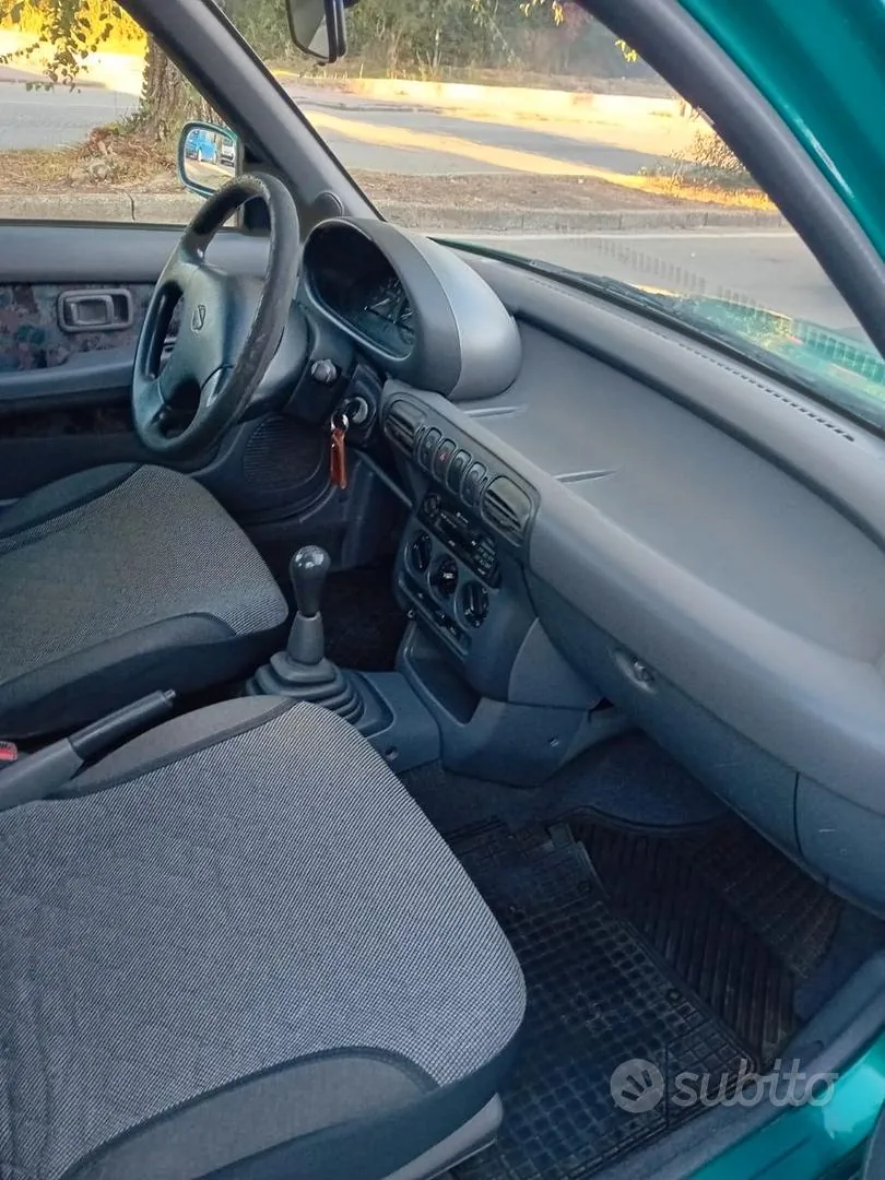 Nissan Micra 1997 photo 5