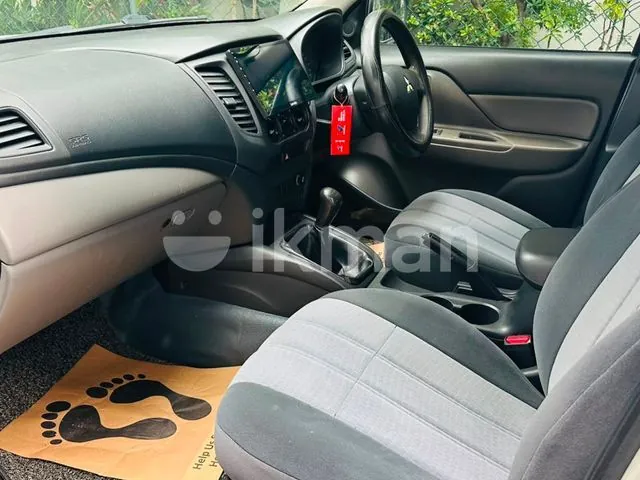 Mitsubishi L200 2016 photo 2