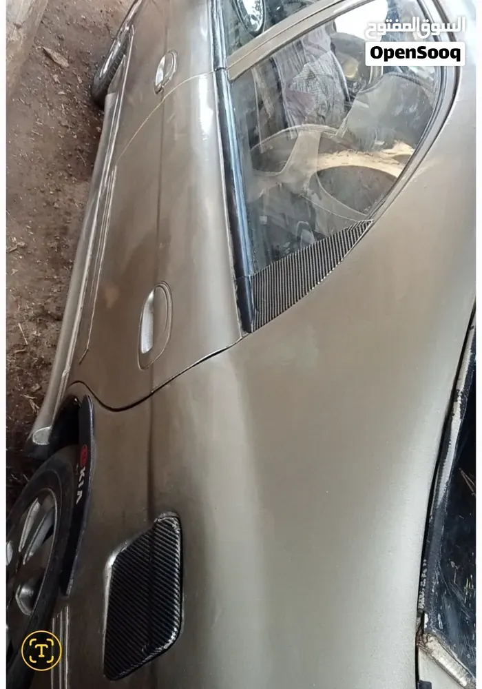 Kia Shuma 2000 photo 4