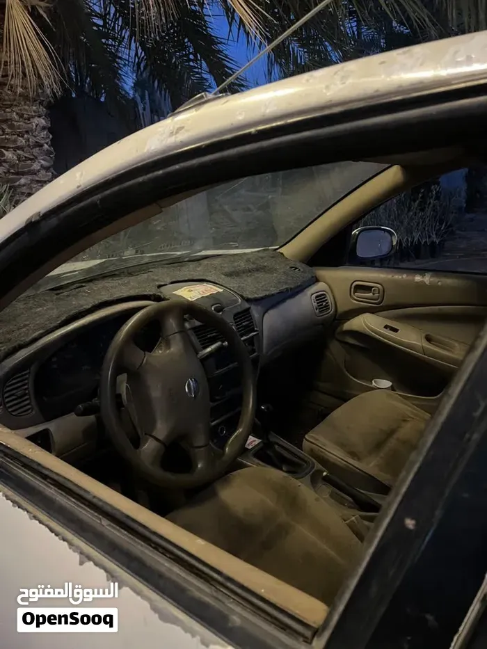 Nissan Sunny 2004 photo 4