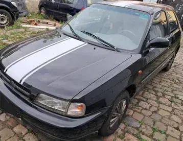 Suzuki Baleno 1998 photo 2