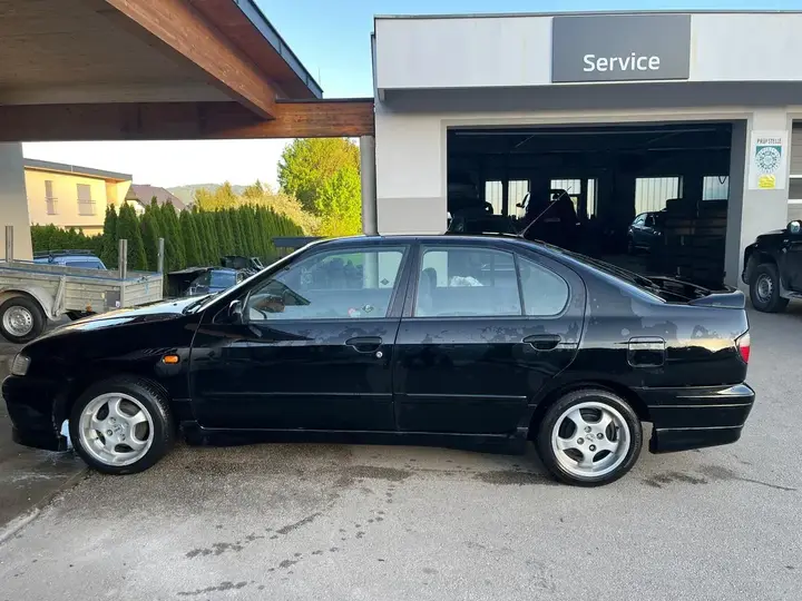Nissan Primera 1997 photo 2