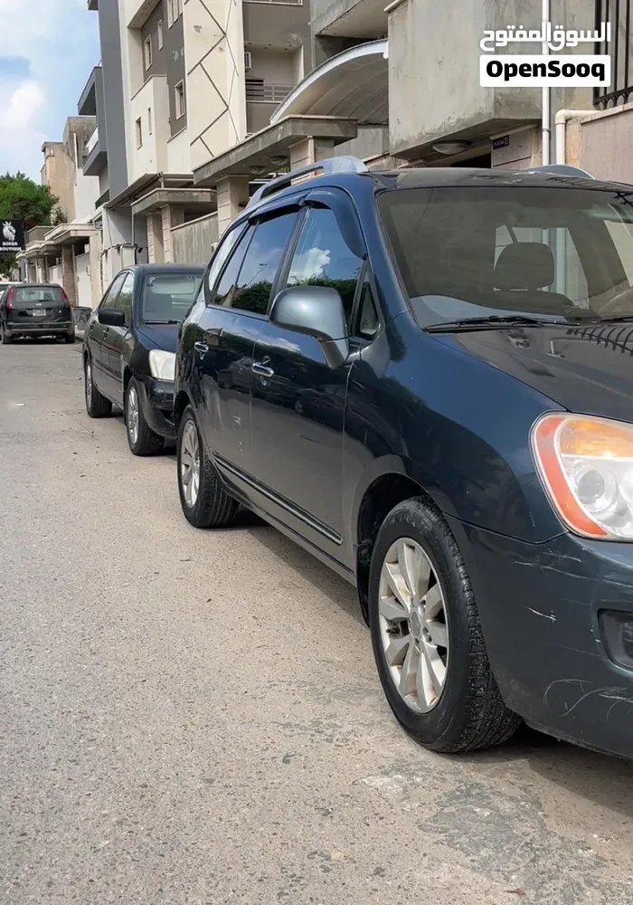 Kia Rondo 2012 photo 2