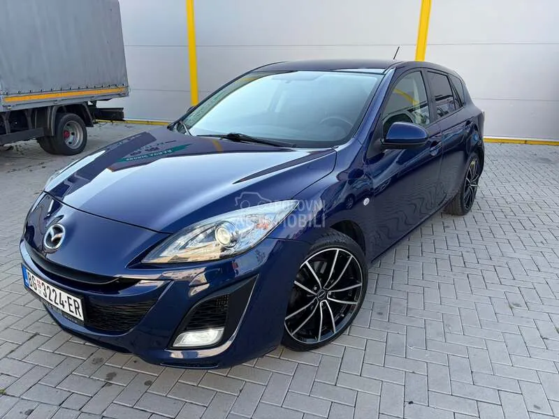 Mazda 3 2011 photo 2