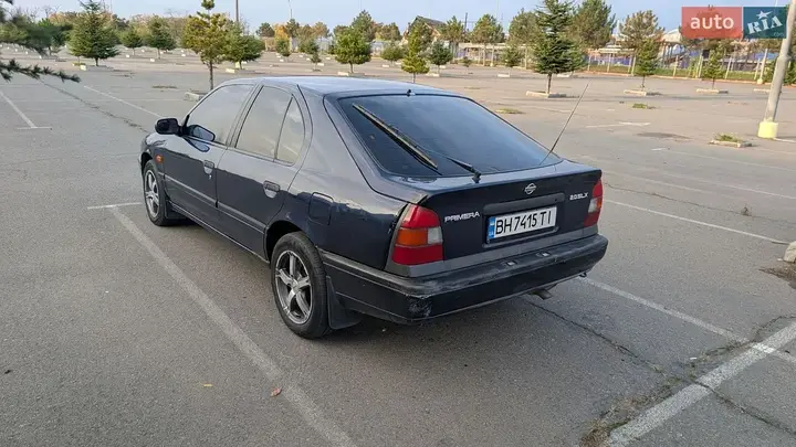 Nissan Primera 1993 photo 4