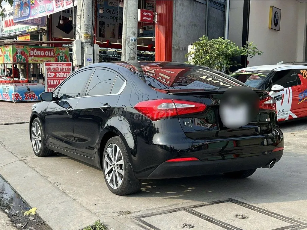 Kia K3 2014 photo 4