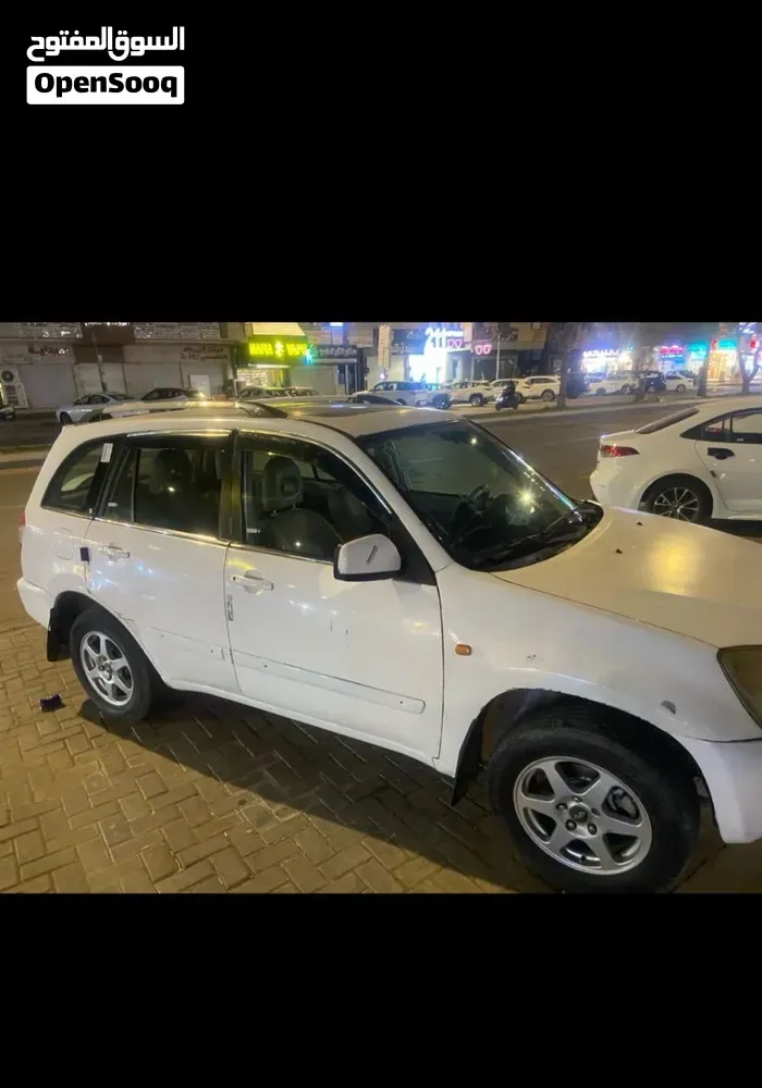 Chery Tiggo 2011 photo 3