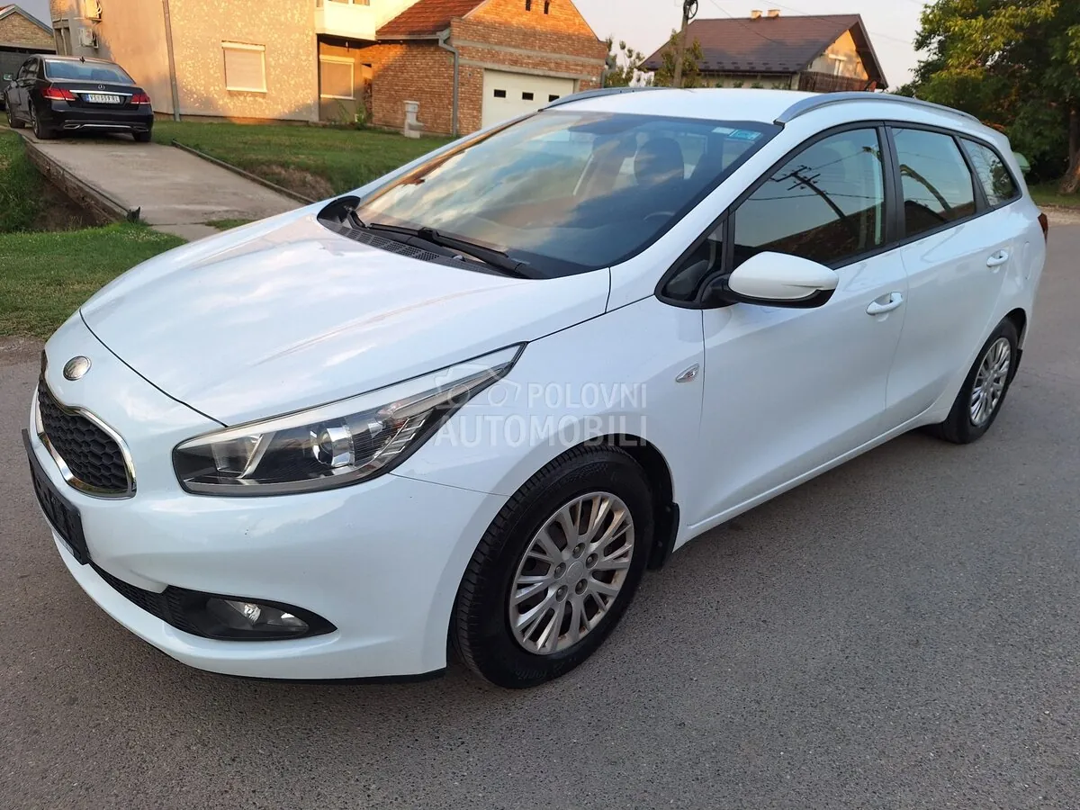 Kia Ceed Sw 2013 photo 2