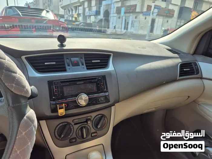Nissan Tiida 2014 photo 3