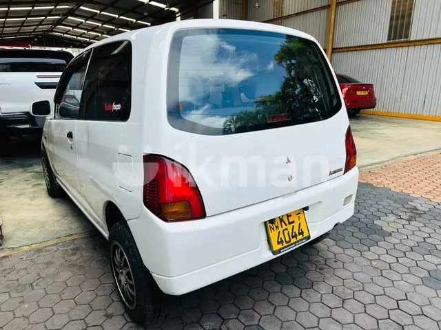 Suzuki Alto 2002 photo 3