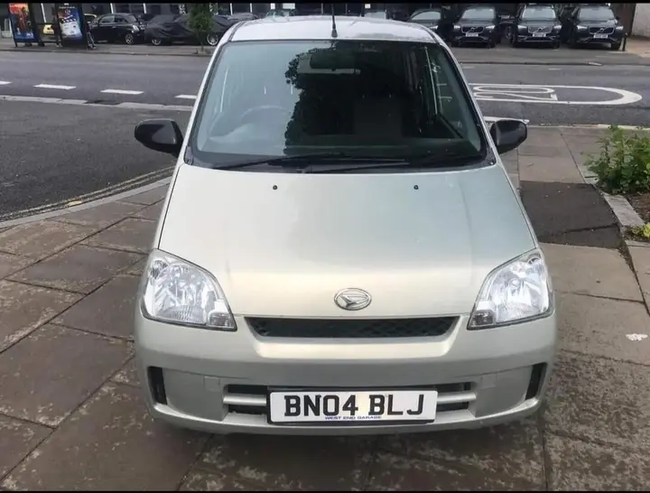 Daihatsu Charade 2004 photo 3