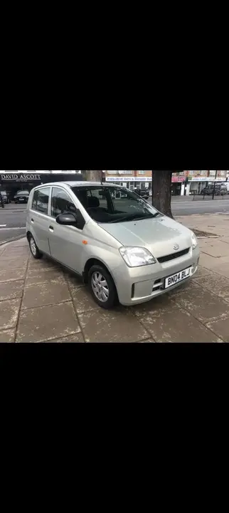Daihatsu Charade 2004 photo 2