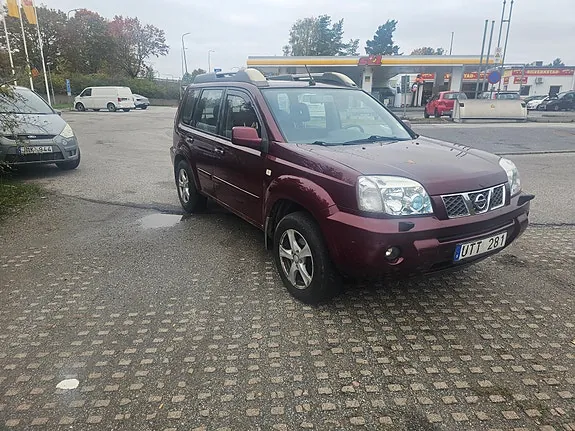 Nissan X-Trail 2004 photo 2