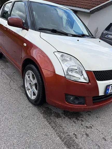 Suzuki Swift 2010 photo 2
