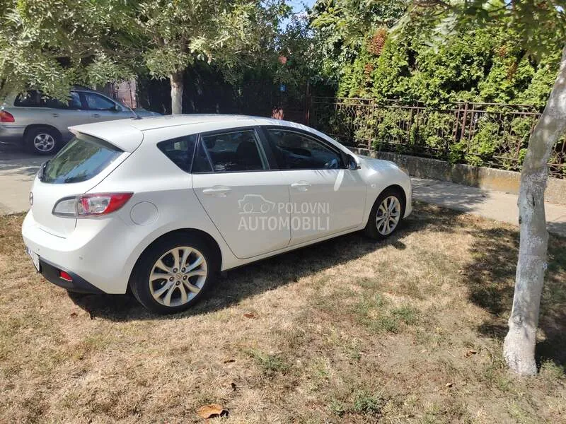 Mazda 3 2010 photo 4