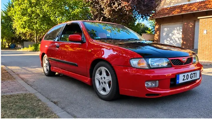 Nissan Almera 1998 photo 2