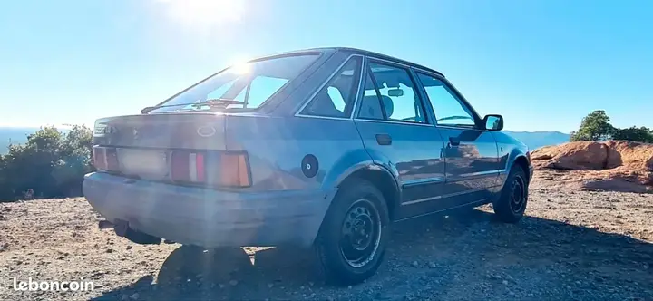 Ford Escort 1987 photo 2