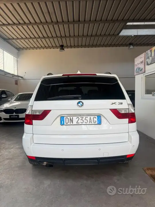 BMW X3 2009 photo 4