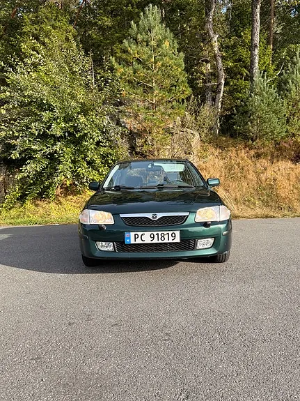 Mazda 323 2000 photo 2