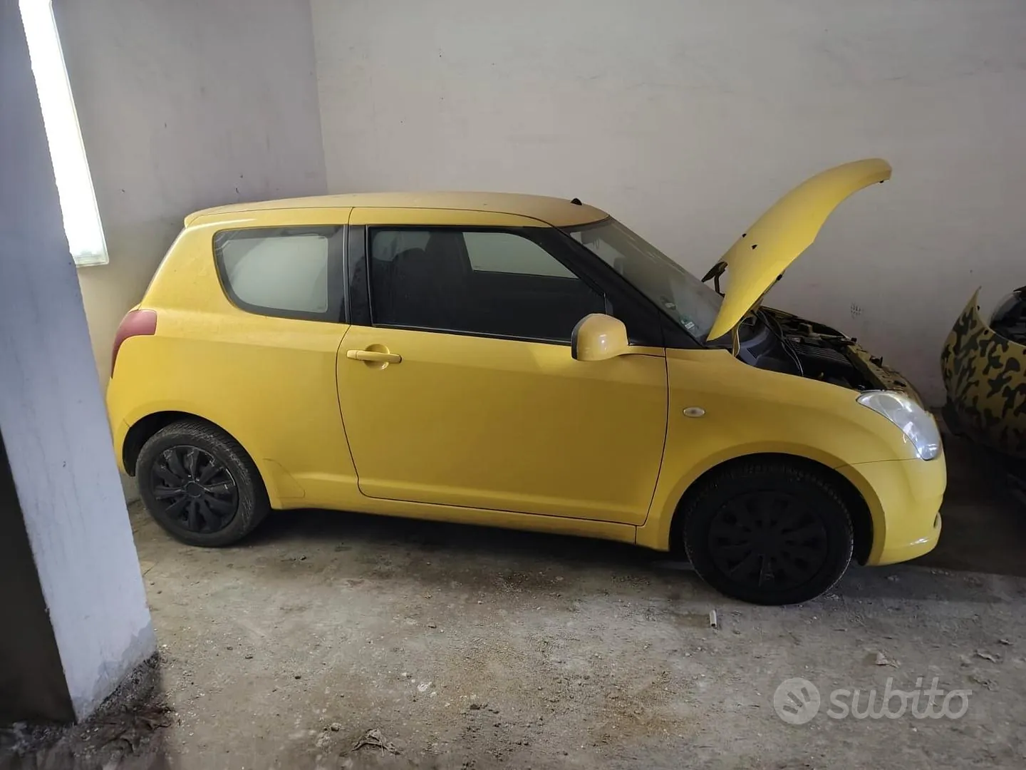 Suzuki Swift 2006 photo 2