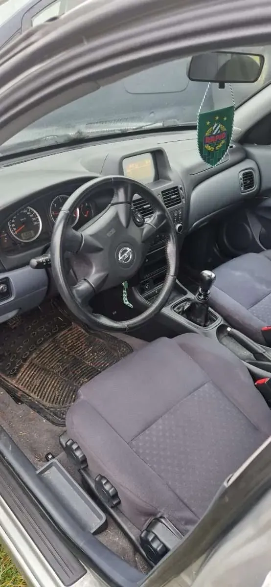 Nissan Almera 2004 photo 2