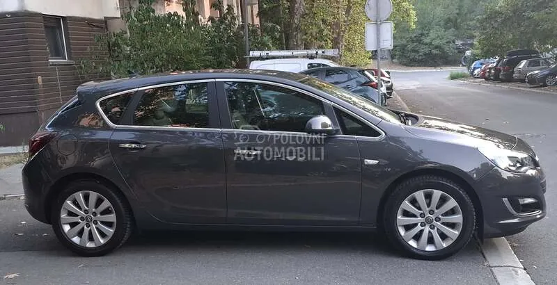 Opel Astra J 2013 photo 4