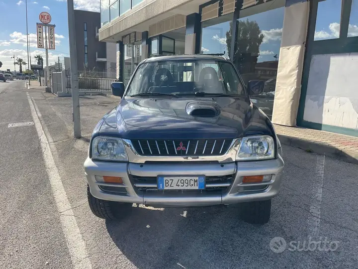 Mitsubishi L200 2002 photo 2