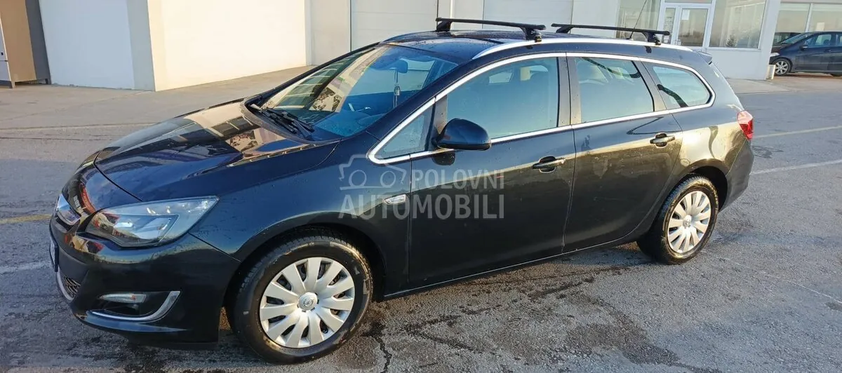Opel Astra J 2014 photo 5