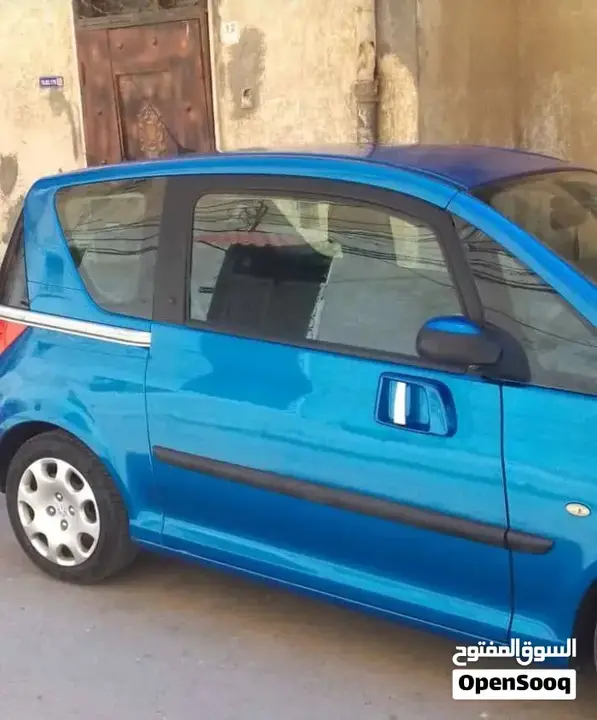 Peugeot 1007 2007 photo 3