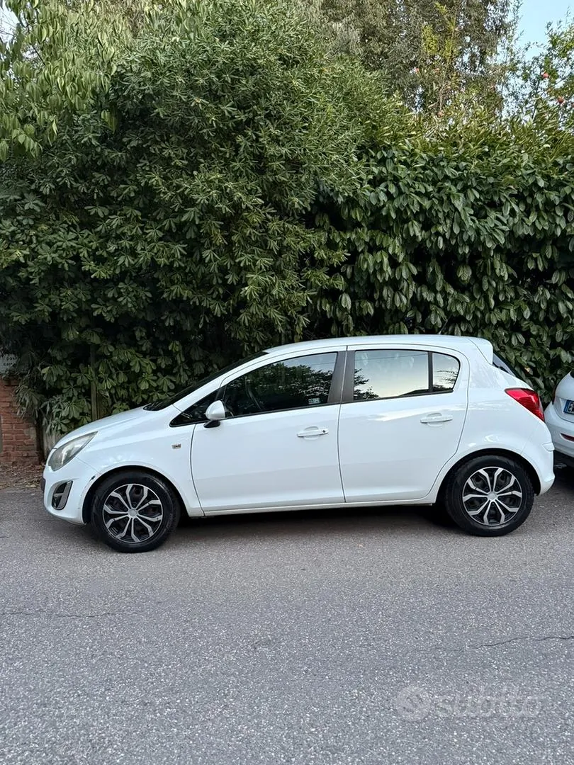 Opel Corsa D 2013 photo 2