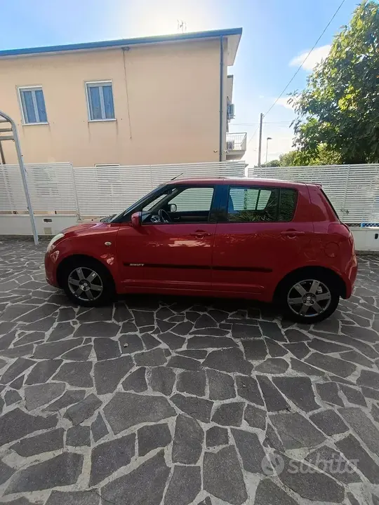 Suzuki Swift 2006 photo 2