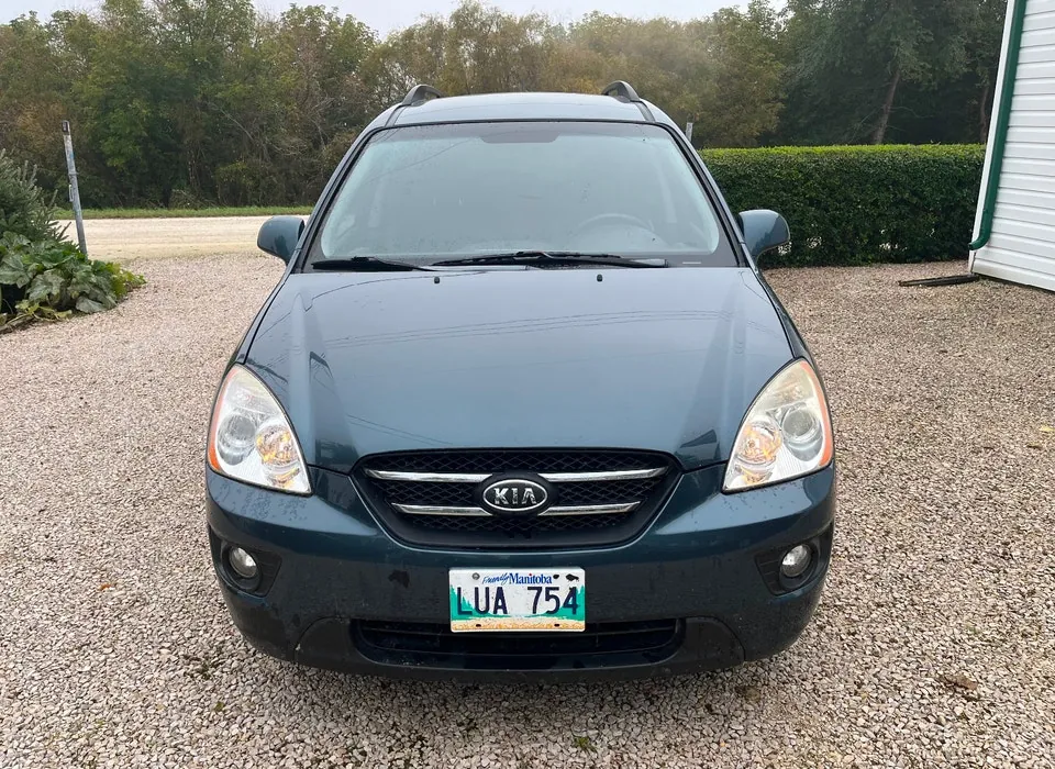 Kia Rondo 2009 photo 4