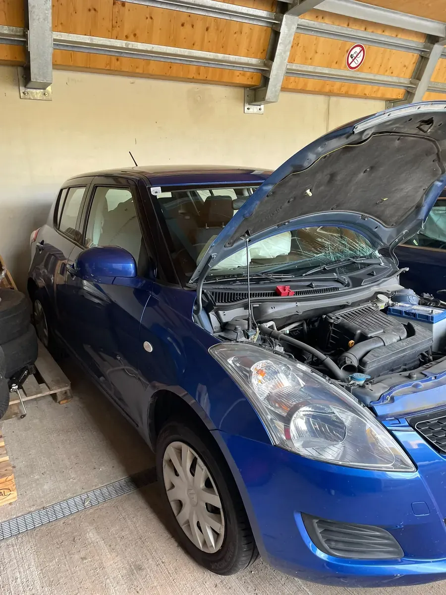 Suzuki Swift 2011 photo 2