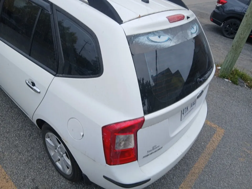 Kia Rondo 2010 photo 3