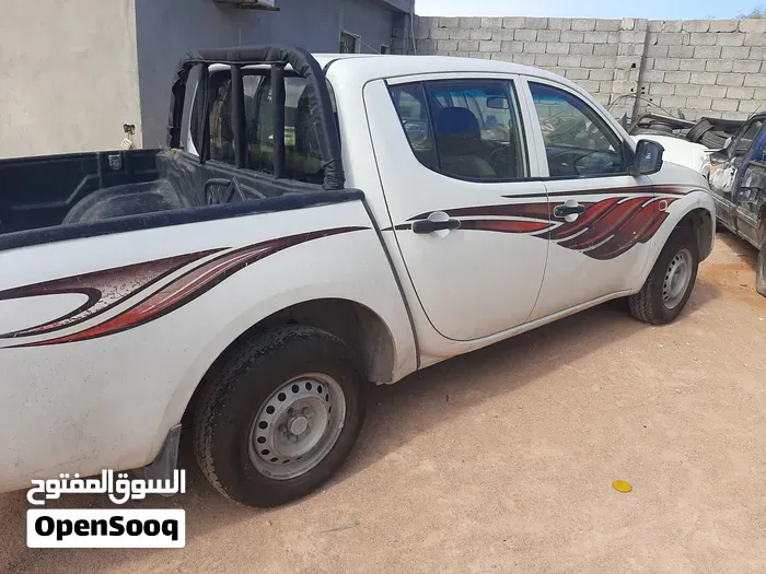 Mitsubishi L200 2008 photo 4