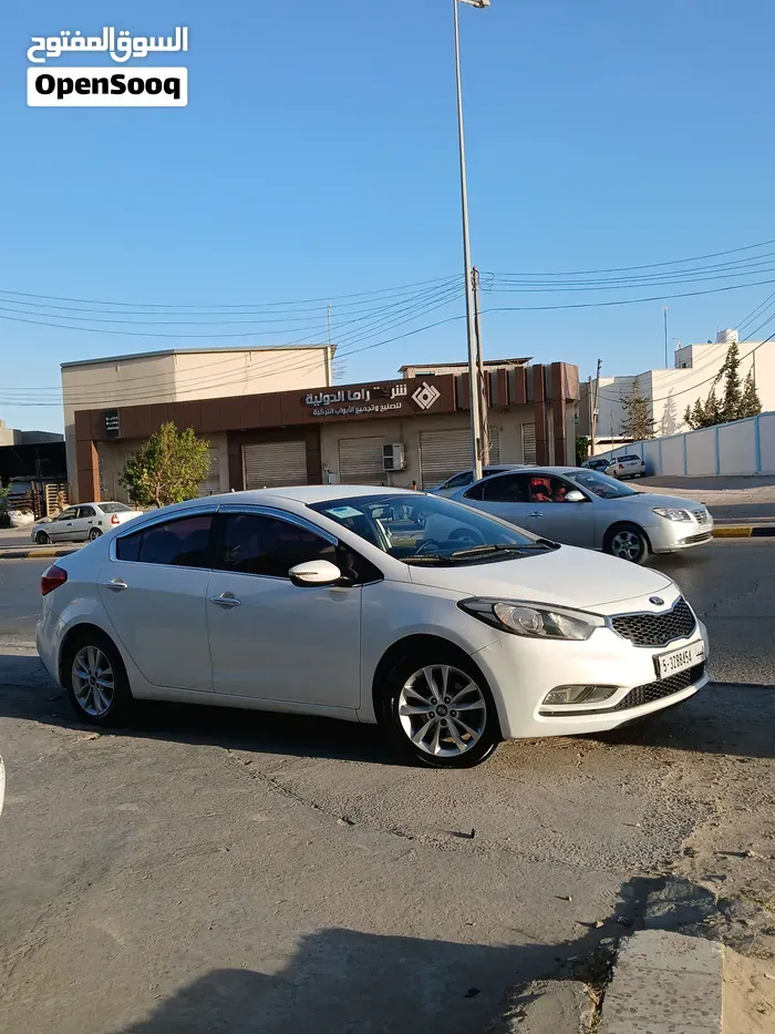 Kia K3 2013 photo 2