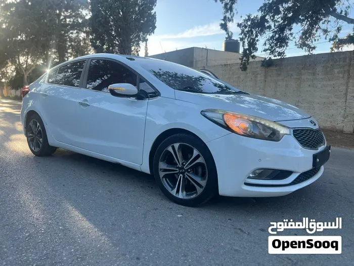 Kia K3 2014 photo 4
